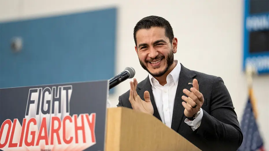 abdul-el-sayed-standing-in-front-of-podium