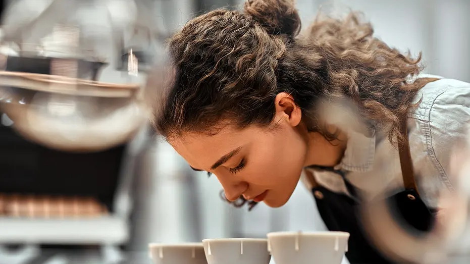 cf00dd89-woman_sniffing_coffee